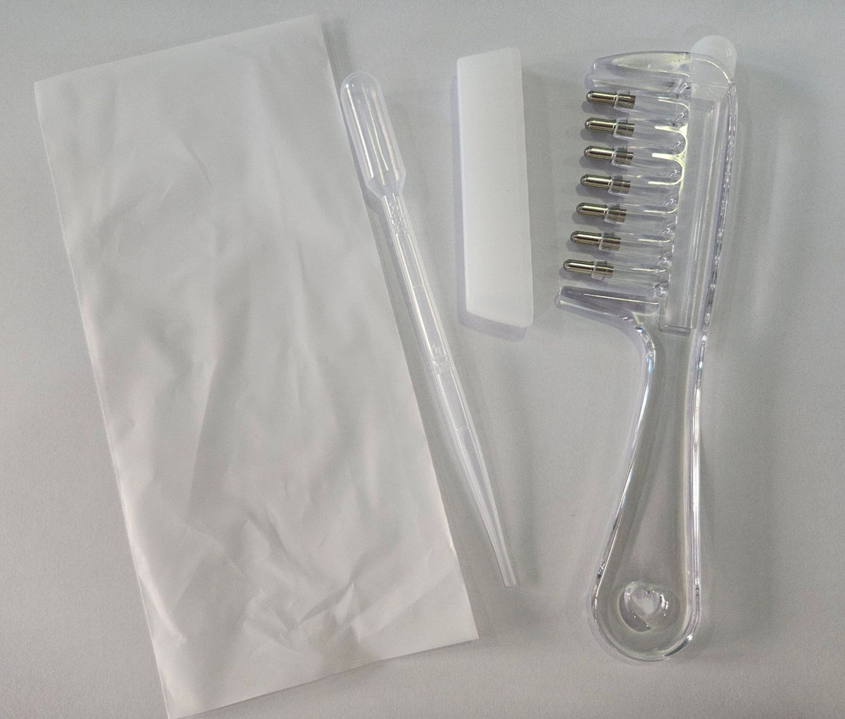 SEPTEMBER26 SET 03 - HAIR OIL APPLICATING COMB